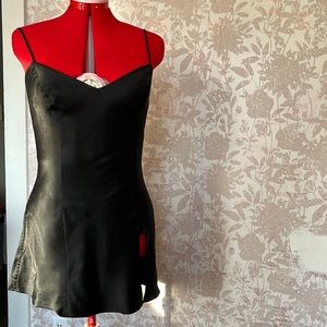 Sleek black Victoria’s Secret mini slip dress: sexy, chic, and timeless